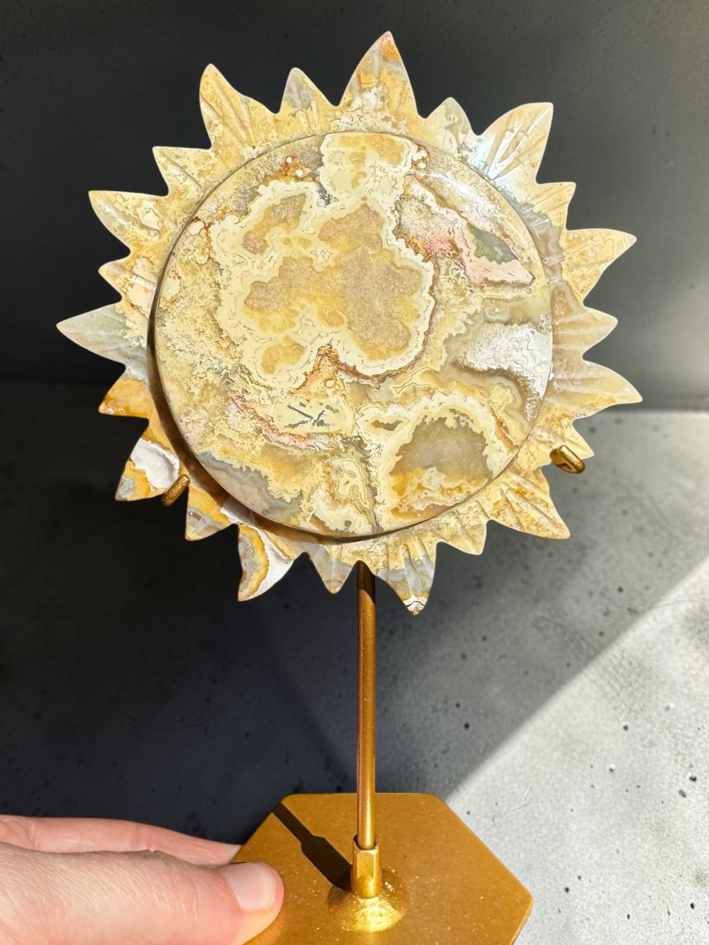 Crazy Lace Agate Sun Carving on Stand